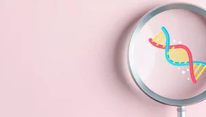 Lupa com dna em fundo rosa